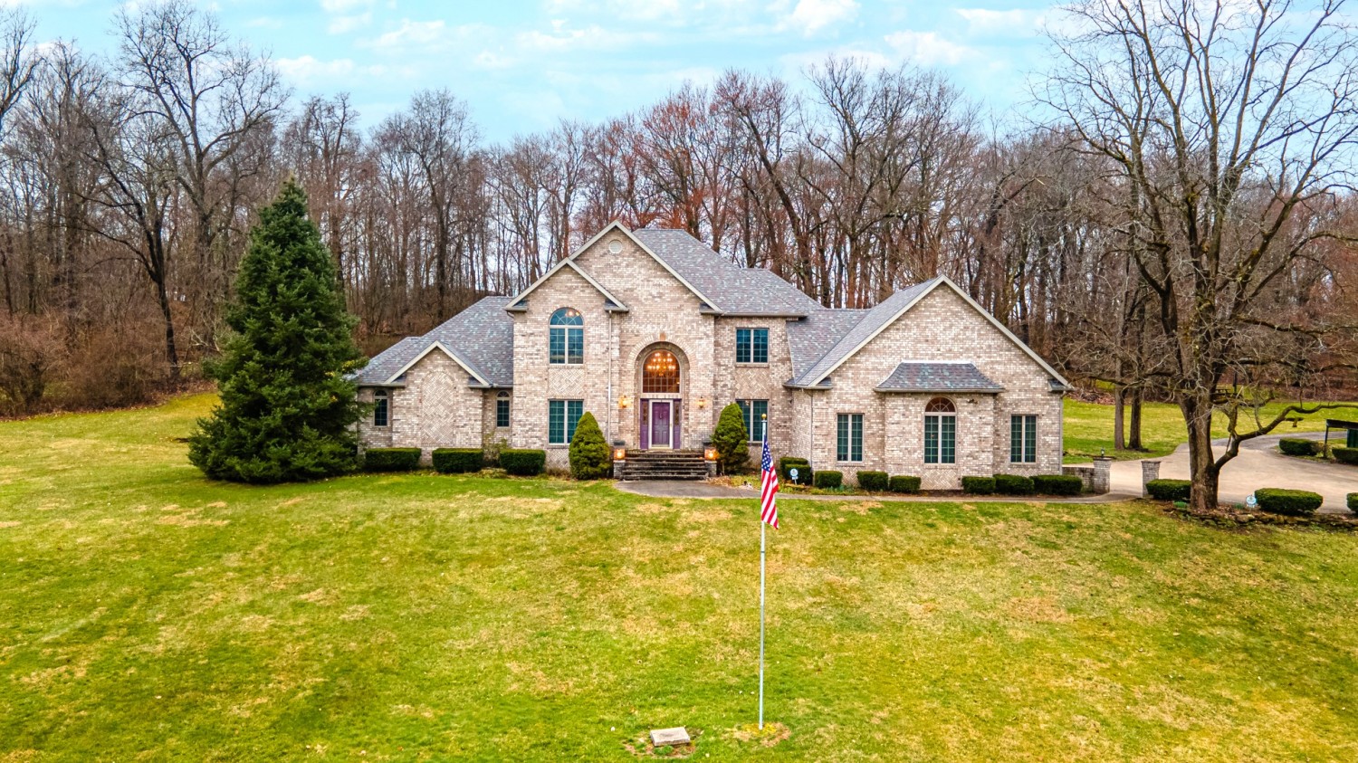 SPECTACULAR HOME ON 8 ACRES! Sluss Realty Featured Properties